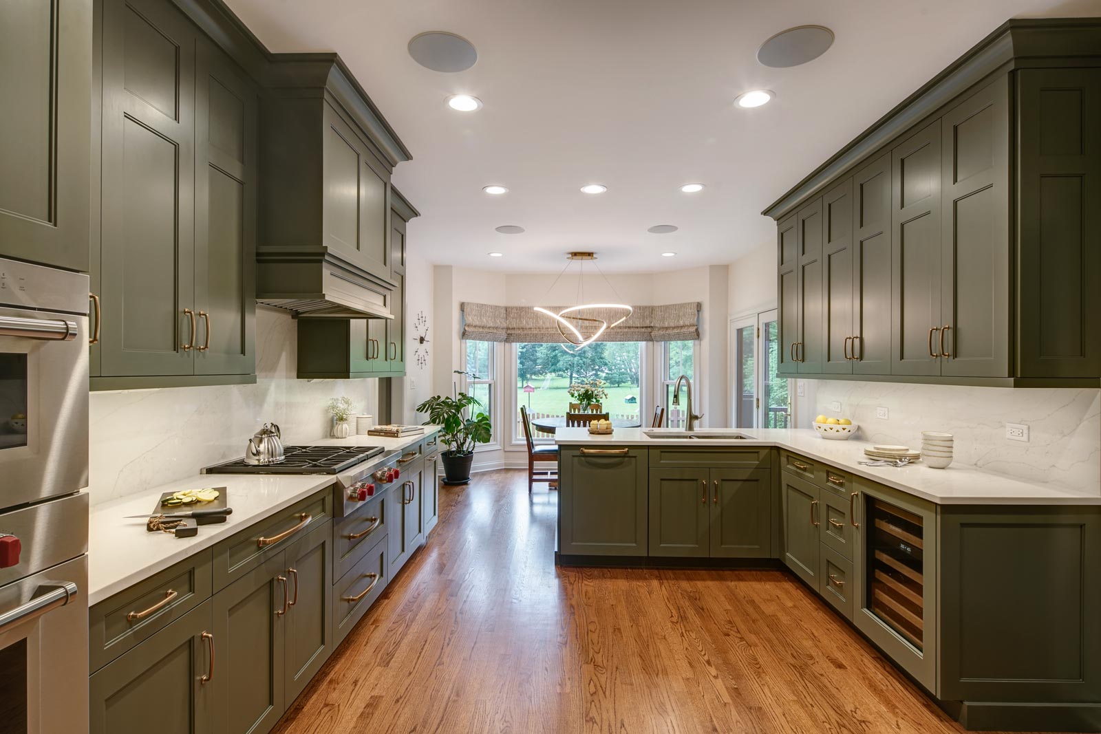 https://www.drurydesigns.com/wp-content/uploads/2023/05/green-kitchen-cabinet-remodel-full.jpg