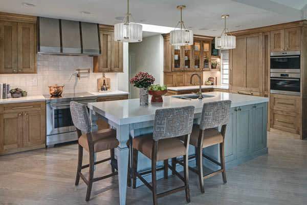 Tour a Spacious Gold and White Chef's Kitchen With Grand Island